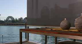 Helioscreen external screen shading a harbour-facing balcony